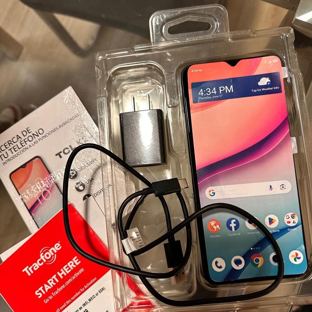 TCL Smartphone with Vibrant Display and Black Charger
